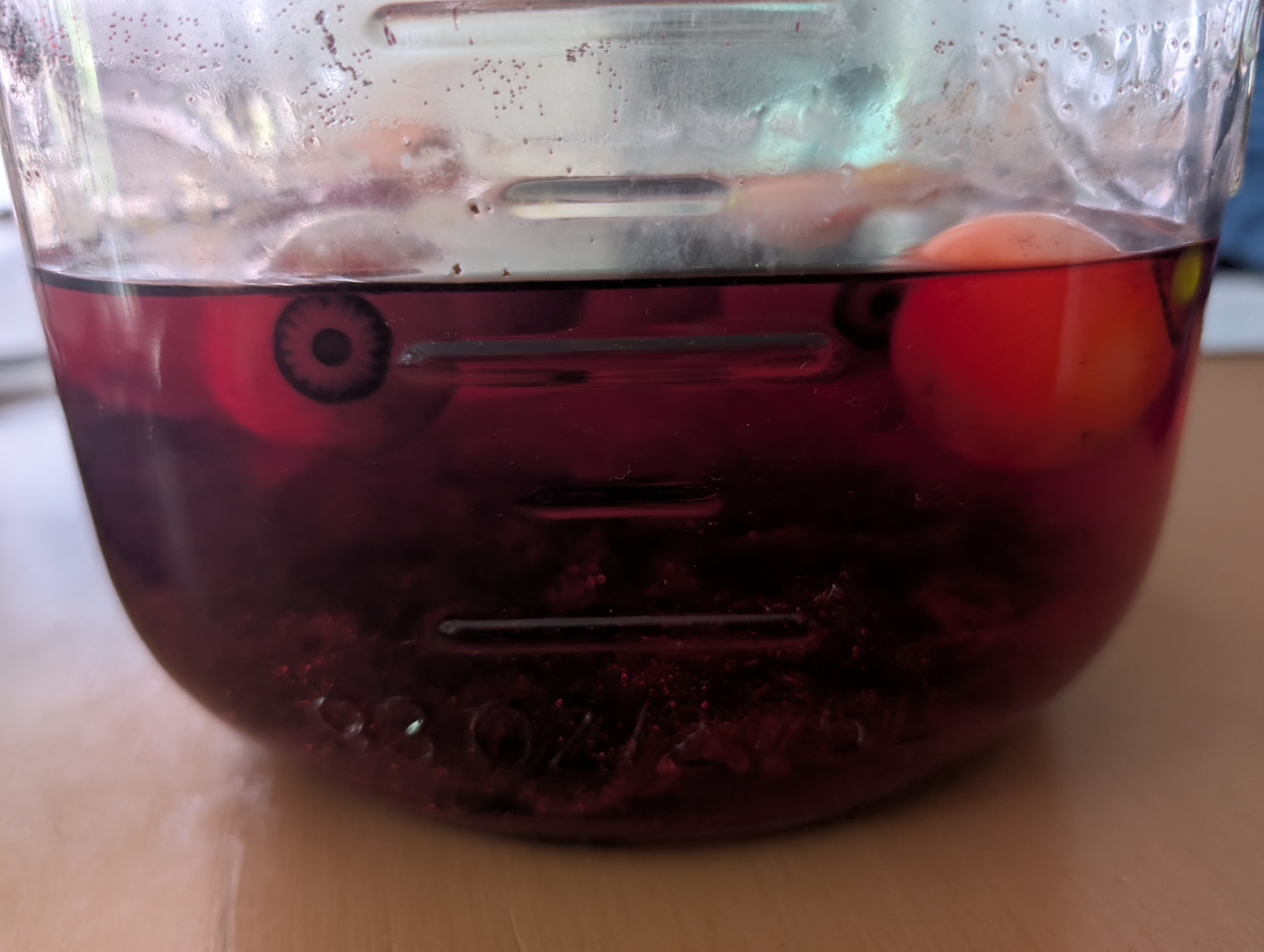 eyes in a jar of red colored water